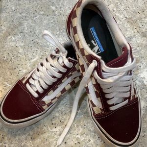 Vans Old Skool maroon checkerboard shoe.
